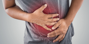 man suffering from chronic constipation pain