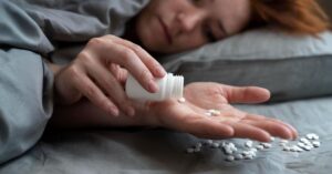 This image is about girl taking pills