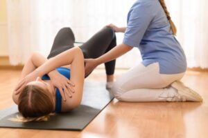 Doing yoga practice for the back pain