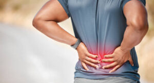 man suffering from back pain